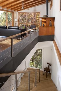 A Contemporary North Carolina Home Navigates a Tricky Site Atop a Ridge - Photo 8 of 10 -