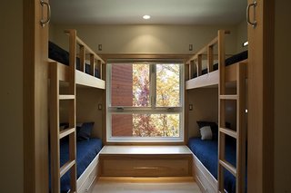 A Contemporary North Carolina Home Navigates a Tricky Site Atop a Ridge - Photo 9 of 10 -