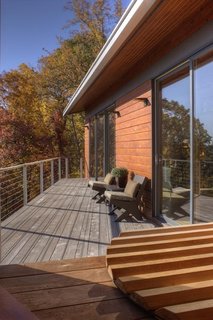 A Contemporary North Carolina Home Navigates a Tricky Site Atop a Ridge - Photo 10 of 10 -