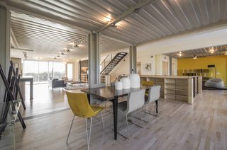 On the second level, maple floors connect all the rooms together, unifying the composition.