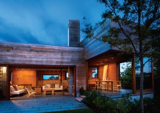At night, subtle light fixtures provide soft ambient light. The lights "as discrete as possible, and aimed at the surfaces of the house, defining space and creating the kind of three dimensional modeling that is easy for the eye to interpret," Snyder says. "It is relaxing, calming, provides plenty of light to live, and as much as possible eliminates visible bright hot spots or illuminated fixtures that call attention to themselves."