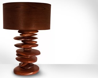 Mastering the Wood Grain - Photo 12 of 14 - The hand carved walnut "rocks" that form the base of this Rock Pile lamp are stacked and spin independently of one another, allowing the pile to change shape. "In contrast to the pixel style of design I often incorporate into pieces, these rocks are my way of being more freeform and not so meticulous," says Michael Rupich.