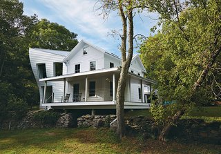 Self-taught designer Tom Givone continued his practice of updating 19th-century farmhouses with unexpected details and salvaged materials with this creation—a torqued-volume addition to an 1850s family homestead in Pennsylvania.