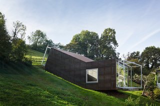 Camera-Inspired Artist's Studio Offers Stunning, Wide-Angle Views - Photo 1 of 7 - Architect Christian Tonko played with a double metaphor when designing the Camera Lucida studio. The name of the cantileverd hillside space, Latin for "bright chamber," references the open window facing the valley below, as well as the skylight that bathes the workspace in natural light.