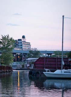 Located in Carroll Gardens, Brooklyn, the original 1916 factory building was converted to rental units in the 1980s and condominiums in 2005. The extensive drop ceilings were probably cost-saving heating measures by the original owner. With the apartment facing the less-exposed north and west elevations, the architect had to maximize the amount of sunlight the space could admit.