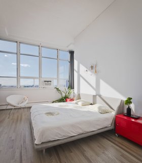 Last but not least, the western-facing master bedroom captures stunning sunsets from its wall-to-wall windows.