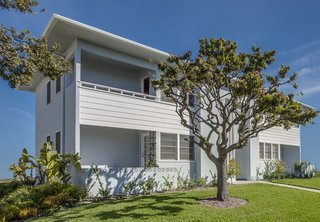 This garden apartment community of Lincoln Place survived a preservation battle spanning more than a decade; it thrives once again with a mix of historic buildings and sensitive new construction.