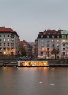 Prague’s Atelier SAD designed the floating Port X concept to have a curved roof, recalling the hull of a ship.