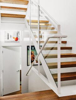 "The treads are open because we wanted to have as much light come down as possible," says Dimster.