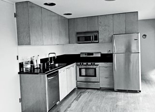The old kitchen became a bedroom that doubles as a study.