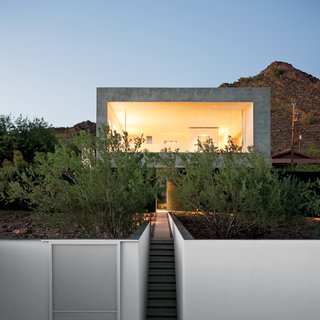"The challenge was to render the site whole again after the original owner ‘bladed’ most of the creosote bush," explains Debra Burnette, who concieved the landscape design.