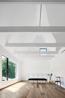 Three Unique Homes Fit Under One Roof for an Extended Family in Queens - Photo 7 of 11 -