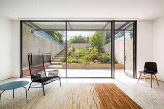 Three Unique Homes Fit Under One Roof for an Extended Family in Queens - Photo 9 of 11 -