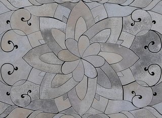 A detail shot of the delicate design, carved 2 inches deep.