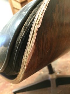 Don’t go DIY with your repairs. If something happens to your piece, take it to a restoration professional. While fixing it yourself may save you money and time, in the long run it can cause irreparable damage to your furniture and decrease it’s value. Pictured is a failed DIY repair with an orange bonding agent on a vintage Eames lounge.