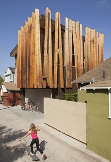 The garage is actually at the back of the house. When the walk streets in Venice were built in the 1920s they were oriented such that vehicle access addressed the back of the house and pedestrian access addressed the front.