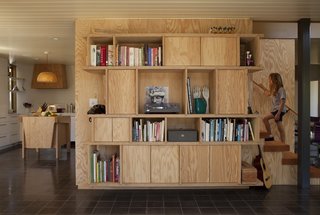 The idea behind the shelving unit off the kitchen is that it would both hide and reveal the stuff of daily life. Clementi and Smith-Clementi are both big Elivs Costello fans, hence the LP of King of America, but they wanted a chance not just to display but also to shut away.