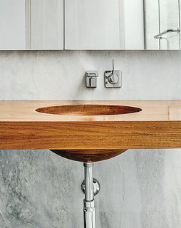 Inspired Indoor Teak Looks - Photo 1 of 14 - Breakfast Woodworks created the custom teak vanity in the master bathroom.
