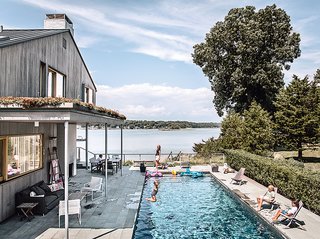 A swimming pool was on everyone’s wish list. Gray Organschi installed it on the east side of the house, along with an outdoor fireplace. The outside pathways and decks are paved in ipe and bluestone.