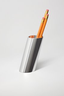 Pen Holder, $240—Easily deposit and withdraw any writing utensil with this angled polished aluminum holder. Photo by: Rodrick Bond