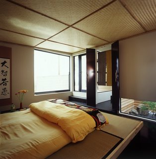 This Japanese-Style Box Home Boasts a Two-Story Bookcase - Photo 3 of 7 -