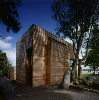 This Japanese-Style Box Home Boasts a Two-Story Bookcase - Photo 5 of 7 -