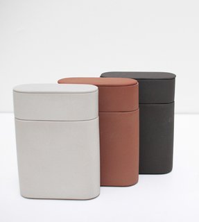 Tea Caddy Set—Skillfully made of smooth clay, this storage-friendly tea set includes a traditional bamboo caddy spoon. Available in brown, light grey, and dark grey.
