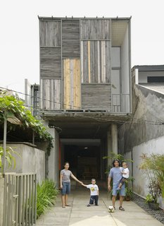 Nugroho Wisnu and his family outside their home in Jakarta shot for the June 2010 issue.