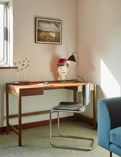 A 2009 Cedric desk by Kay + Stemmer occupies the study.