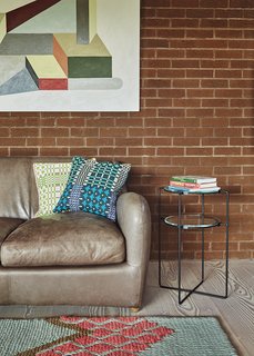The tiered side table was designed by Jasper Morrison.