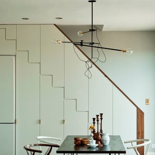When one thinks of a chandelier, often an elaborate, shimmery fixture comes to mind. With its Industrial Chandelier, Workstead pares this idea down to capture the function of a chandelier—an overhead lighting fixture—with the simplicity of clean lines and a flexible design. The three-arm chandelier can be reconfigured into a variety of shapes, making it an adaptable piece for a many interior spaces. Structured as a horizontal fixture, the Industrial Chandelier can hang just three feet from the ceiling, or as a vertical piece, it can hang five feet for a more dramatic effect. Crafted from steel, repurposed industrial joints, and vintage Hubbell sockets, the lighting fixture has a mechanical, vintage aesthetic, while its minimalist design, exposed cords, and unshaded bulbs have an undeniably modern sensibility.