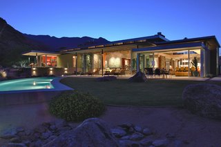 While the exterior of the house remains open, its placement allows for solitude. The homeowners relish both the panoramic views and sense of privacy their home offers. Photo by: NuVue Interactive/Lance Gerber.