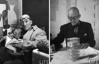 It all starts with the specs. Thick, round, black, and as demonstrated here, equally dapper whether worn on the face or forehead.