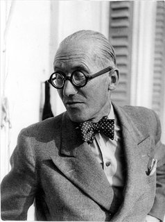Architects weren't the only professionals to favor bow ties—surgeons, printers, and anyone else who didn't need a necktie flapping around as he worked wore them. But Corbu's bow gives his peak lapels and pocket square a bit of elan you rarely found on country doctors.