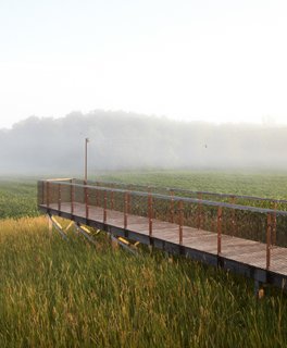 An early morning shot of the long deck at The Treanor Residence.