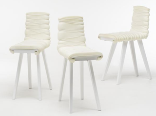 Bistro Light<br><br>Upholstered chair with slightly distorted proportions, which enable new ways of using the chair. Limited edition. Manufactured by Thorsen Møbler.
