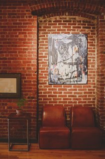 "Having a seat" in the reception area of Codeacademy’s New York office isn't like having a seat at your dentist's. Worn leather coupled with local art and a splash of green gives you the sense that this startup has arrived. Photo by Chellise Michael Photography.