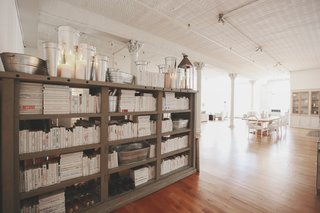 When this client said she'd impulse bought a 12-foot, reclaimed bookcase from across the street, we chuckled. Photo by Chellise Michael Photography.