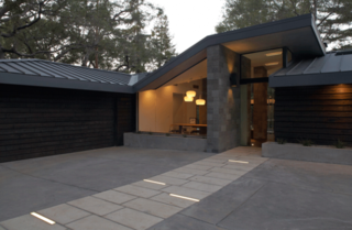 Barely perceptible from the street above, the Kim Residence by Form Environment Research (fer) Studio is designed to blend into the shadows of the La Canada foothills. Photo courtesy of Jack Coyier.