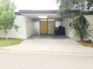 The front facade of H House, a 1962 house by architect Richard Banta restored by resident Brent Nichols.
