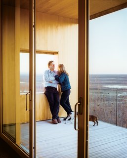 This Modern Cabin Is the Ideal HQ For a Family in Alaska - Photo 12 of 19 - The sliding doors to a deck are by the Canadian company Dynamic Architectural Windows & Doors.