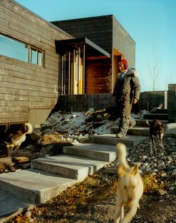 This Modern Cabin Is the Ideal HQ For a Family in Alaska - Photo 16 of 19 - Perched on top of a hill, the house is accessed by a long staircase that runs up to the exterior courtyard. The dogs, naturally, take their own route.