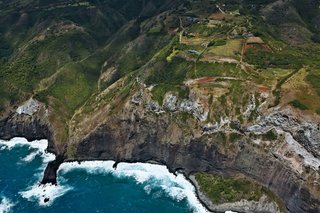 Slovenian expats Robert and Drazena Stroj spent many hours driving around different parts of the island in search of land before finding their cliffside oasis.