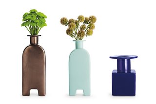 Here's a trio of vases from the collection Strum discussed in the talk. The ceramic Footed Vases (left and center) come in a bronze finish and celadon. The Cube Vase (right) shows how classical forms continue to inform Graves's work.