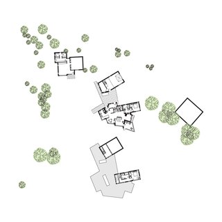 Bullitt Residence Floor Plan: A Art Studio, B Sound Studio, C Garage, D Breezeway, E Pantry, F Kitchen, G Office-Alcove, H Mudroom, I Guest Bathroom, J Guest Bedroom, K Meditation Room, L Screened-in Porch, M Living-Dining Room, N Barn, O Exercise Loft, P Master Bathroom, Q Master Bedroom