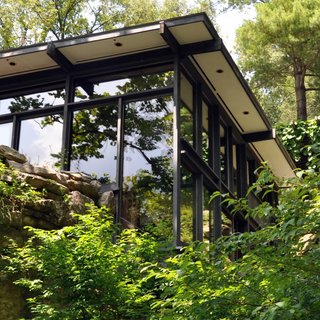 The Remarkable Home of Modernist Designer Russel Wright - Photo 1 of 9 - While Wright designed the interior, architect David L. Leavitt is generally credited with the exterior. Manitoga postdates Frank Lloyd Wright's Fallingwater (built in 1936-39), and while the there is some resemblance, the latter was not a direct inspiration. The two Wrights were not related but were acquaintented with each other.