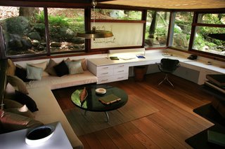 The Remarkable Home of Modernist Designer Russel Wright - Photo 4 of 9 - Wright's studio, enveloped by windows, sits at level with the landscape around it.