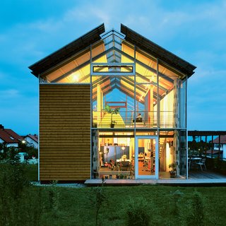10 Modern Glass Homes - Photo 2 of 10 - Architect Reinhold Andris has lived in this house in southwestern Germany since 1998. Fifteen years on, the structure remains emblematic of his modernist perspective. "It’s a very open architecture," he says, noting the near-invisible steel frame and pervasive use of glass. 