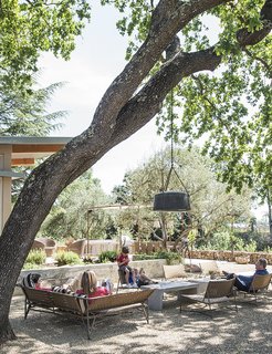 The property includes a rental unit and several outdoor living areas.