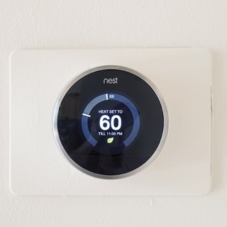 When Willson is within 30 miles of the house and the temperature is below a certain level, his Nest Thermostats are programmed to heat it up to 70 degrees.